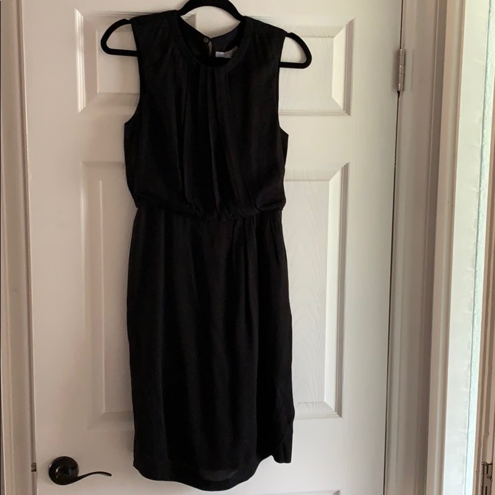 Above the knee work attire dress.